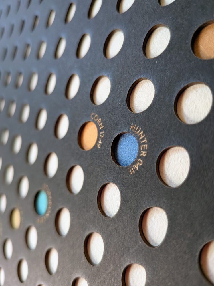 Moonatics | Lunar Calendar 2026 Shadow Edition Close-up of Moon Phase Lunar Calendar – Shadow Edition, detail of crescent and full moon design and engraved text.