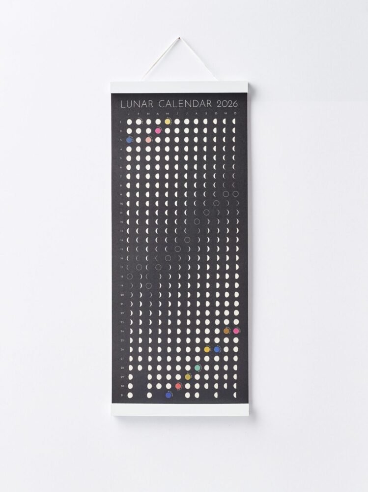 Moonatics | Lunar Calendar 2026 with white hanger Moon Phase Lunar Calendar Print hanging on wall with teak magnetic poster frame, modern minimalist home décor.