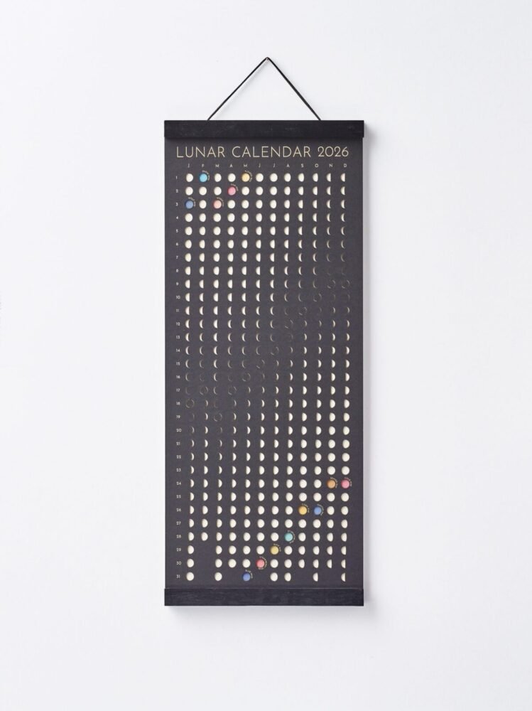 Moonatics | Lunar Calendar 2026 Shadow Edition Moon Phase Lunar Calendar – Shadow Edition hanging on wall with black magnetic poster frame, modern minimalist home décor.
