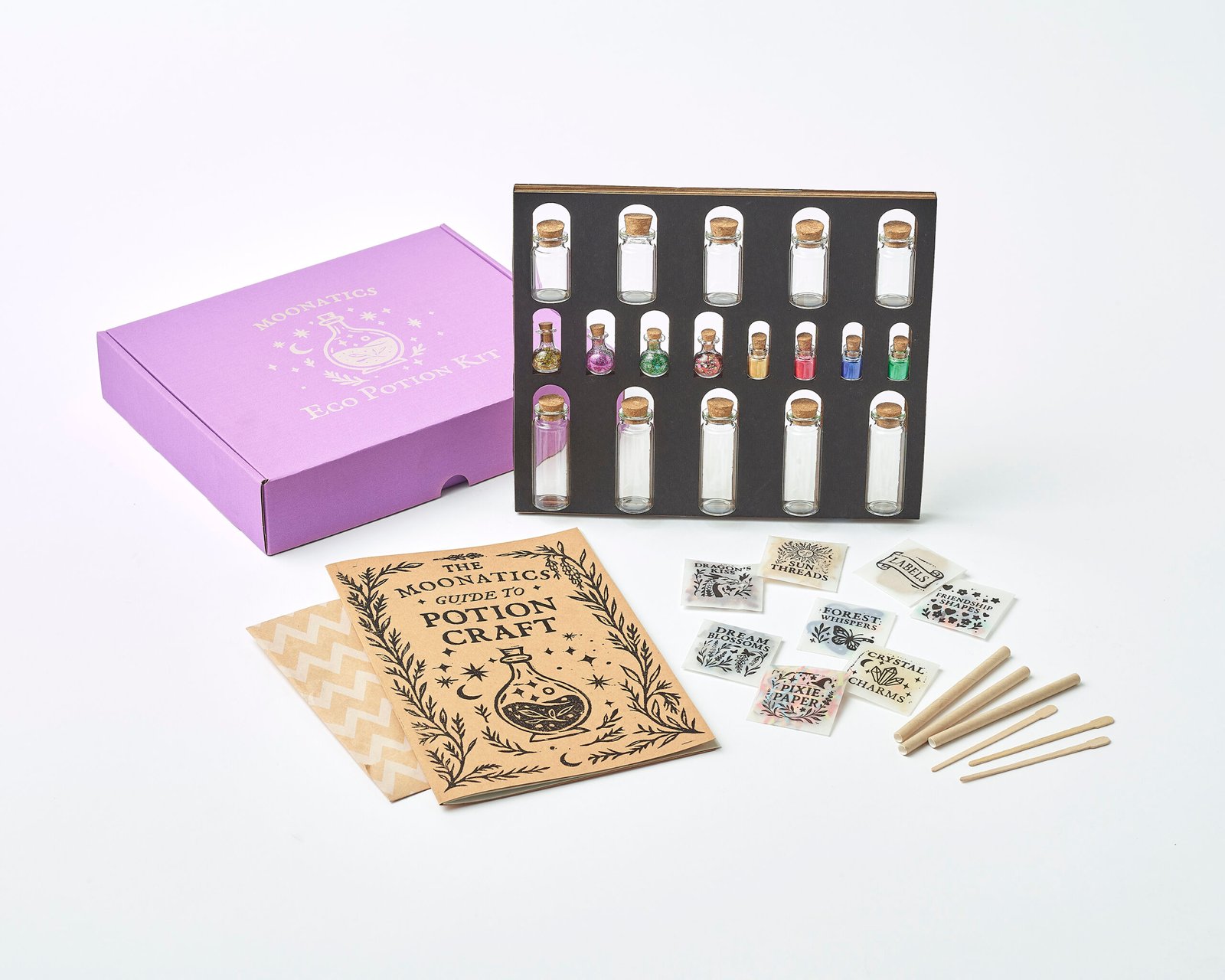 Moonatics Alchemist Eco Potion Kit — potion bottles filled with mica powder, biodegradable glitter, and natural magical mix-ins.