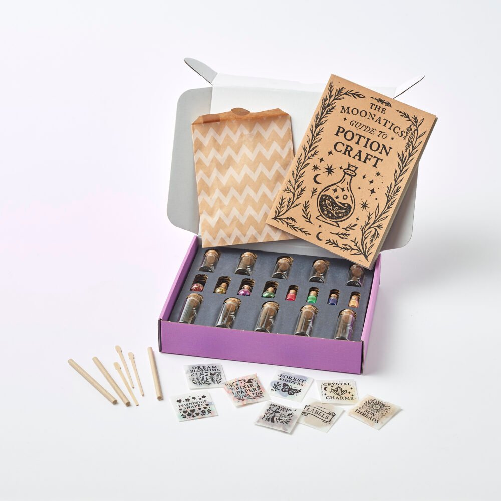 Moonatics Alchemist Eco Potion Kit — potion bottles filled with mica powder, biodegradable glitter, and natural magical mix-ins.