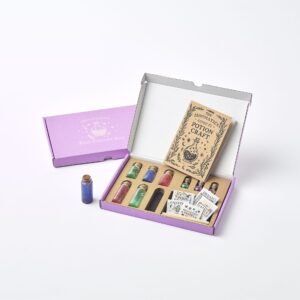 Apprentice Eco Potion Kit contents — potion bottles filled with mica powder, biodegradable glitter, and natural magical mix-ins.