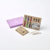 Apprentice Eco Potion Kit contents — potion bottles filled with mica powder, biodegradable glitter, and natural magical mix-ins.