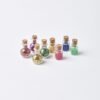 Small potion bottles of eco glitter and mica powder