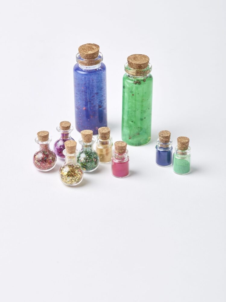 Small potion bottles of eco glitter and mica powder