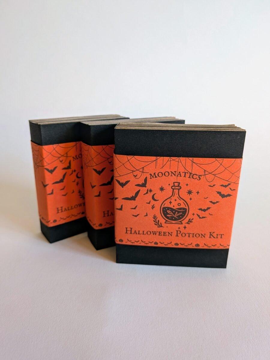 A stack of 3 Moonatics - Halloween Eco Potion Kit