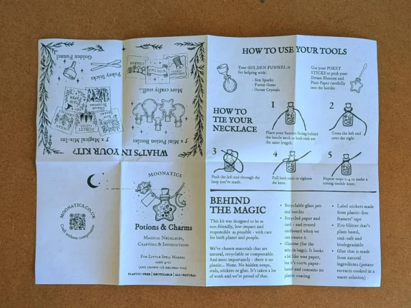 necklace_booklet_front Fold-out instruction booklet with illustrated guides for making potion bottle necklaces, using the included tools and assembling charms and wish tags.