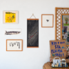 lunar-calendar-2027-creative-studio-lifestyle Moonatics 2027 lunar calendar hanging in a creative studio with artwork and handmade objects